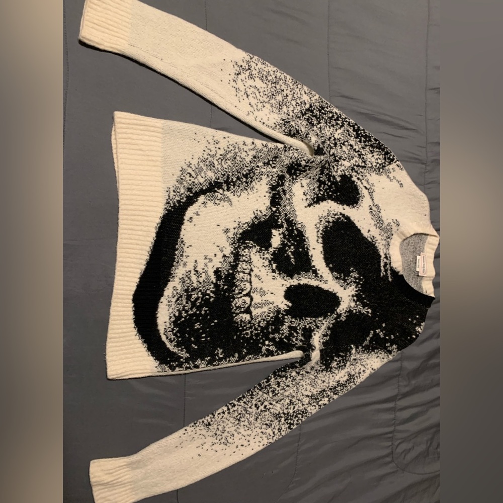 This is a Alexander McQueen crew neck skeleton sweater